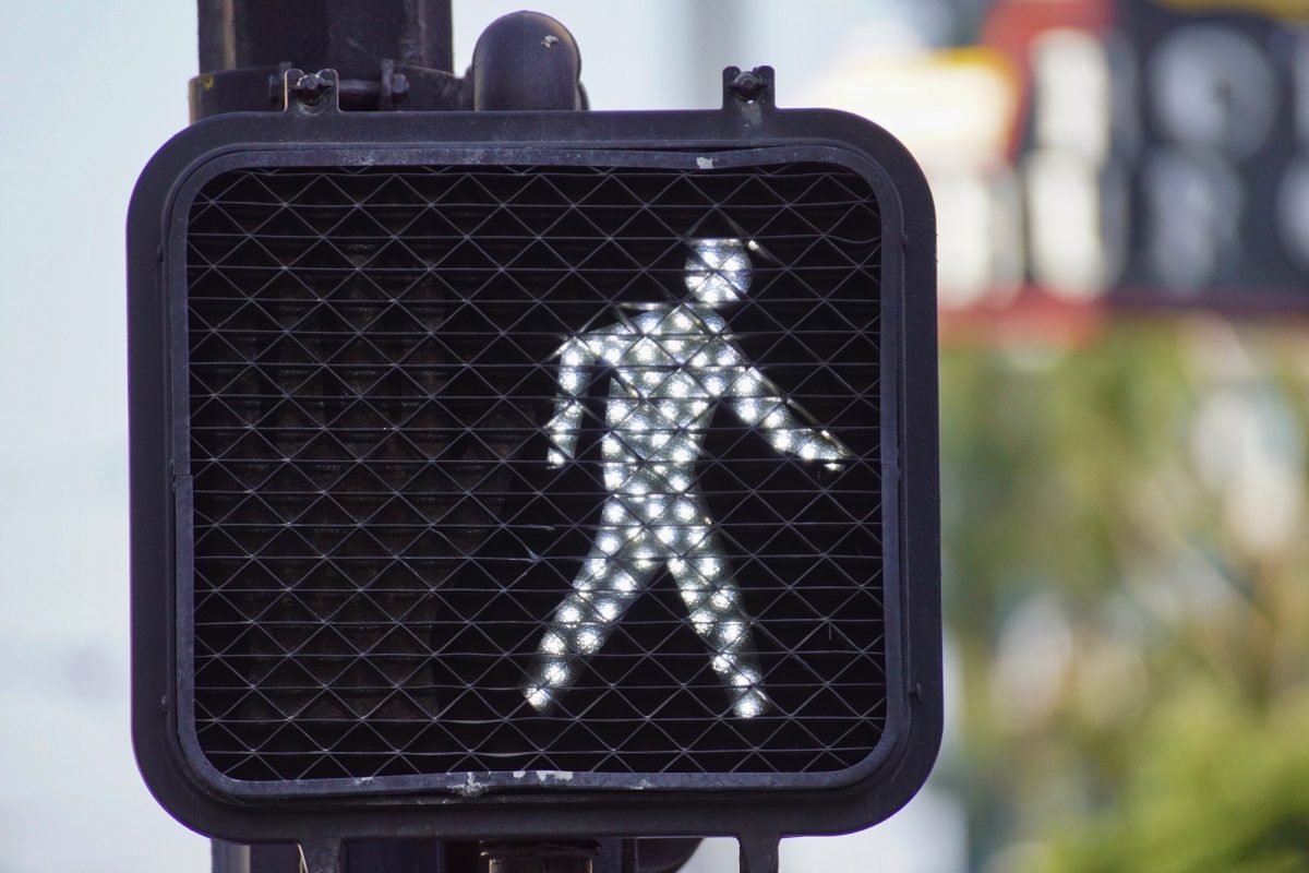 Walk light signal street crosswalk.